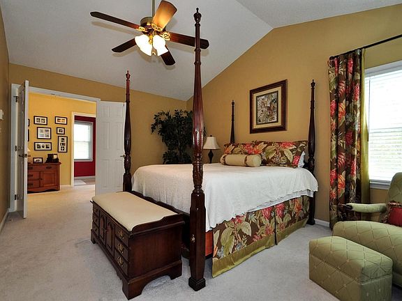 French doors and vaulted ceiling