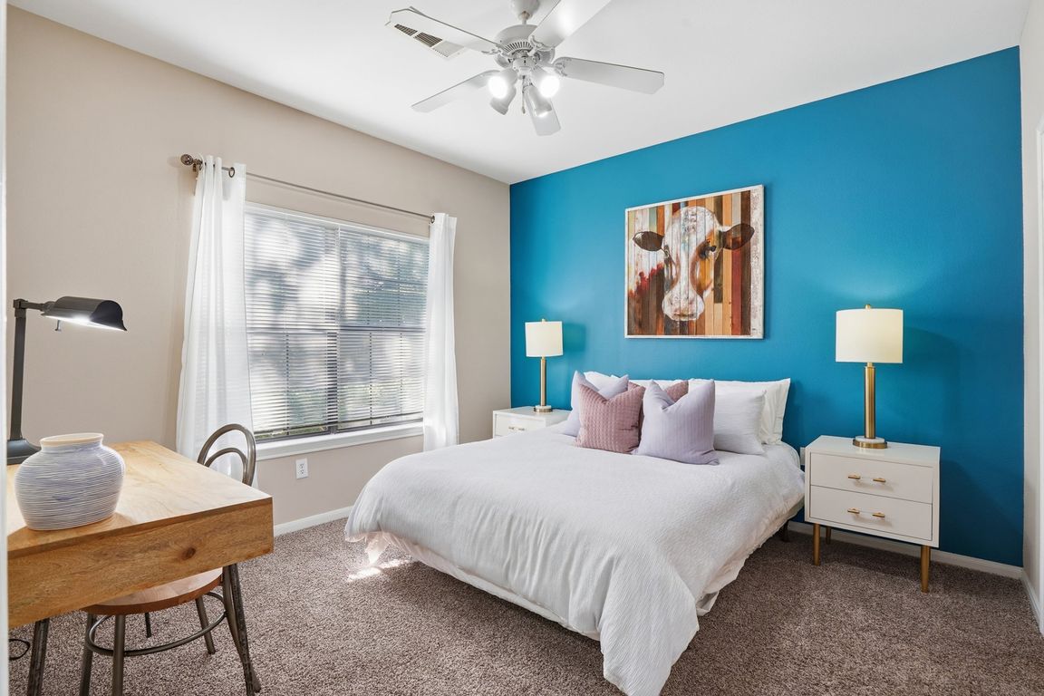Large Bedroom with room for two nightstands, and a desk