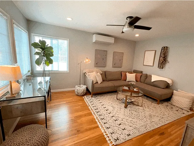 Living room, shown furnished for display only.
Remote controlled ceiling fan and AC split for year round comfort.
Recessed lighting and beautiful hardwood floors. - 4735 Marlborough Dr