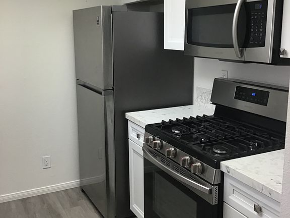 Refrigerator with ice Machine, self cleaning gas range, misrowave