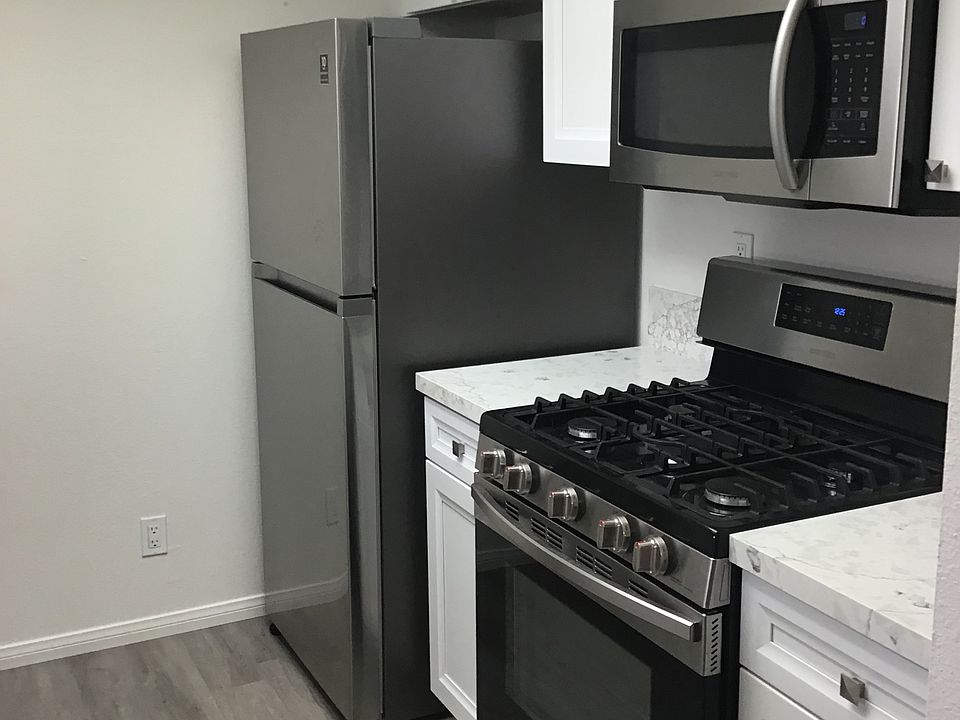 Refrigerator with ice Machine, self cleaning gas range, misrowave