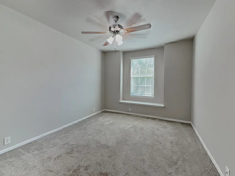 Spacious bedroom with ample na