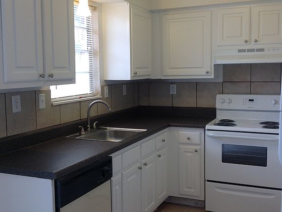 Newly remodeled kitchen with new counterops and cabinets