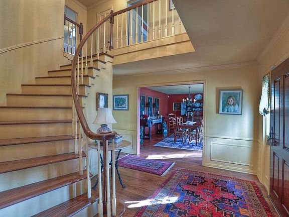 Foyer gives the first glimpse into the designer details that were put into this home. From the oak t