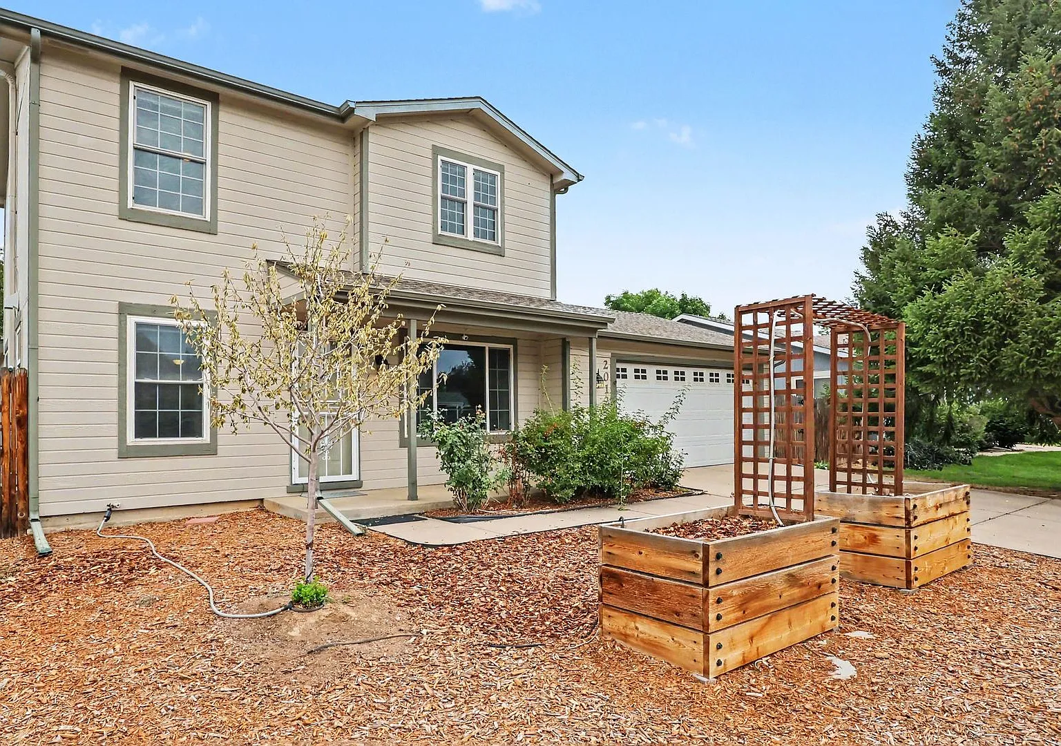 Spacious 4-Bedroom Home with Mother-in-Law Suite in Poudre School District Available Now! — Photo 2