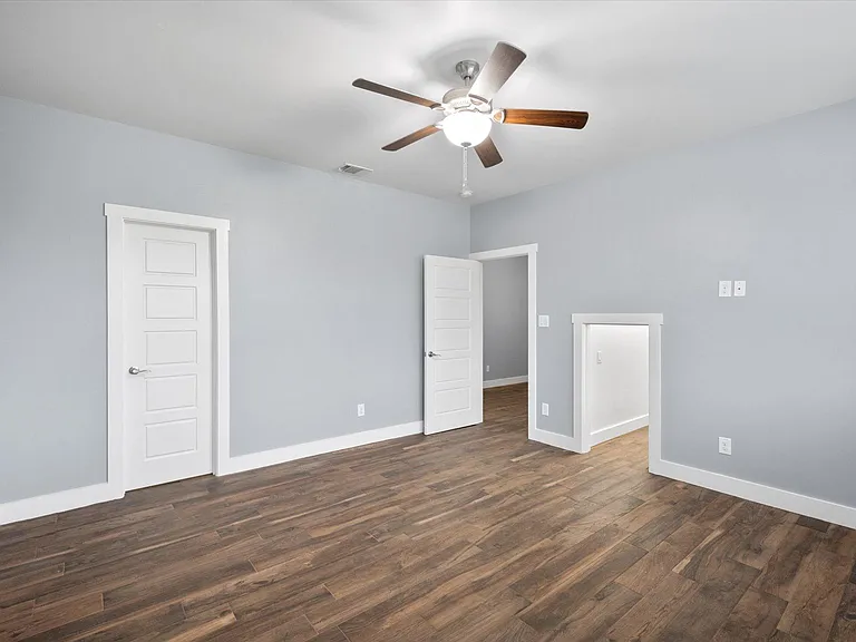 Upstairs bedroom with closet and extra storage