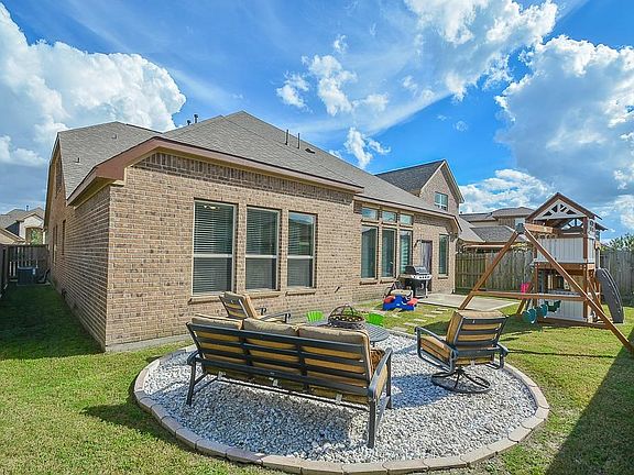 Get ready to entertain with the fire pit area ready to go.