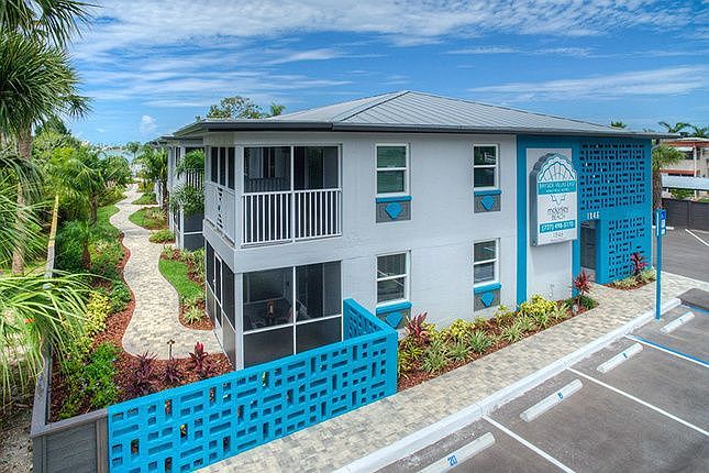 Exterior image of the property buildings. The property is Garden Style.