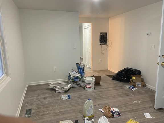 Living room open to kitchen. Has door way to finished laundry room in basement(pictures not yet available of laundry room).