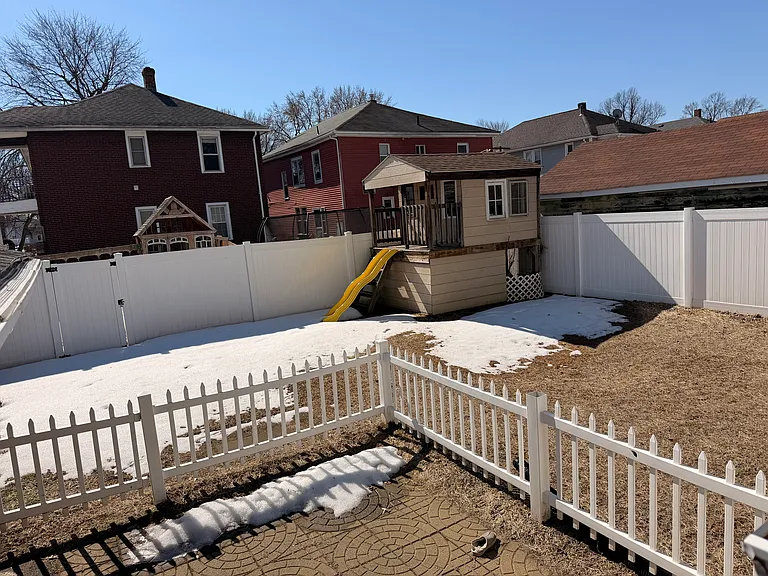 Backyard with playhouse/slide
