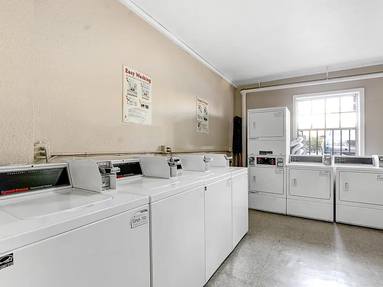 On-site shared laundry room of 608 building