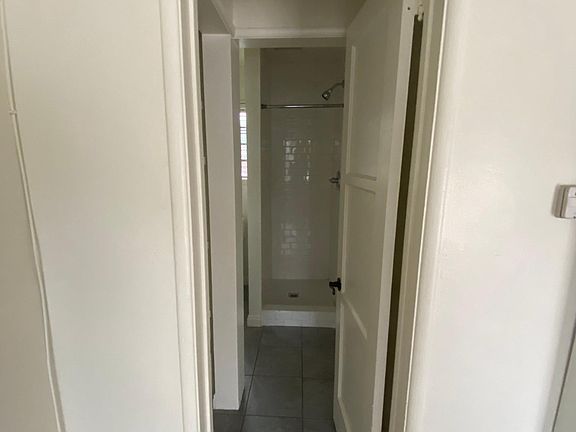 Entrance to 3/4 bath with additional storage space