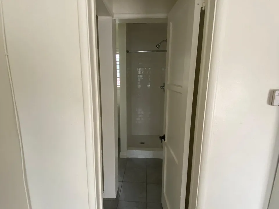 Entrance to 3/4 bath with additional storage space