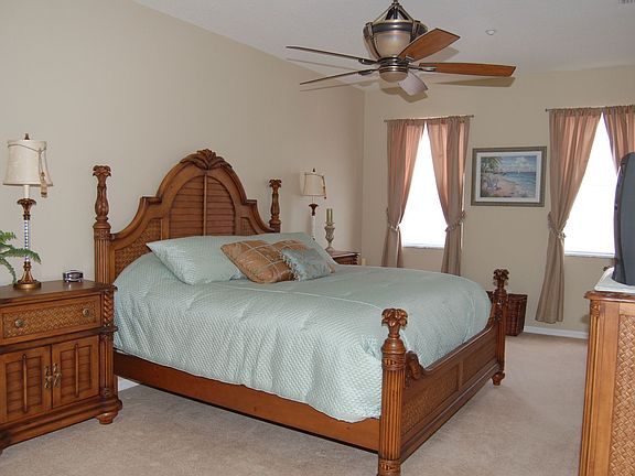 Master Suite with His and Hers Walk in Closets