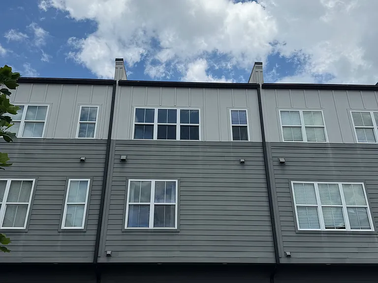 Outside of townhome, two-car garage
