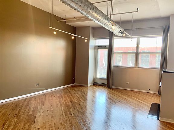 Loft-Style Living Room - High-Style Diagonal Hardwood Flooring!