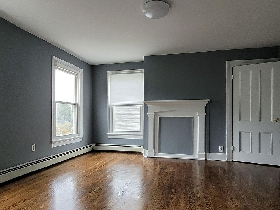 Living Room with Decorative Fireplace