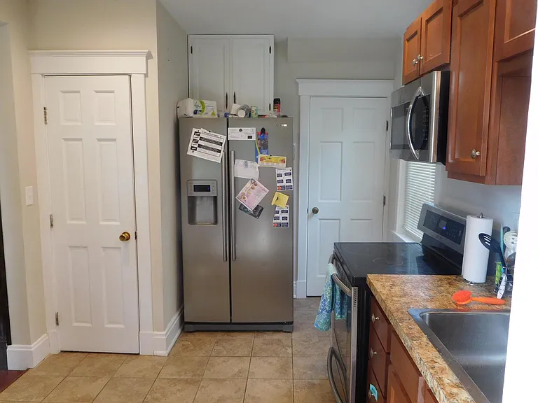 Pantry on left, door to lower level on right