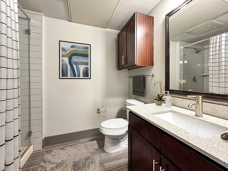 Experience luxury in this contemporary bathroom, designed for elegance and comfort.