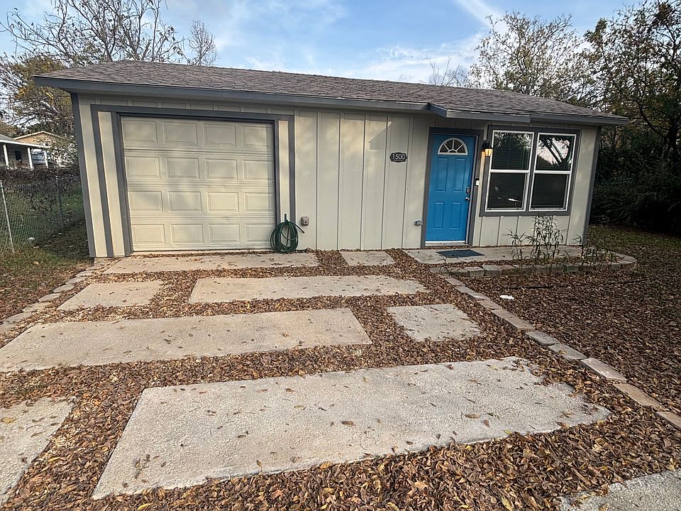 Front, the garage was converted to second bedroom with attached bathroom.