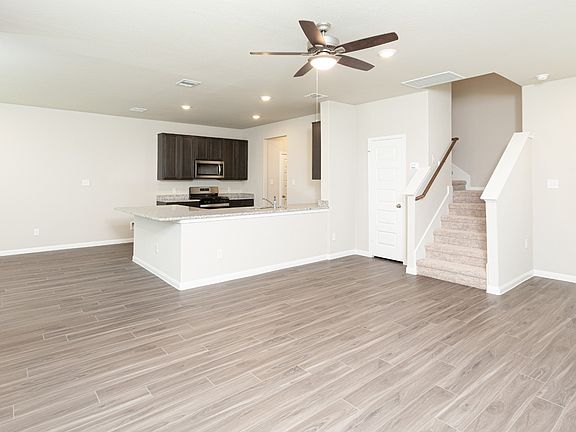 Family Room to Kitchen and Dining Area