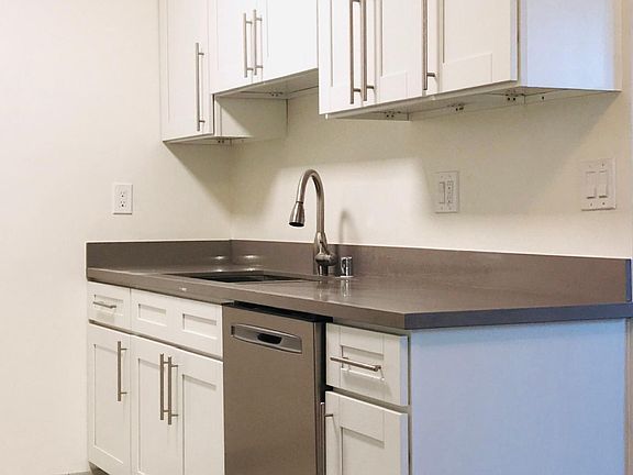 All new cabinets, granite, countertop sink and faucet