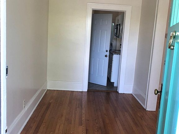 Entrance through front door into hallway.