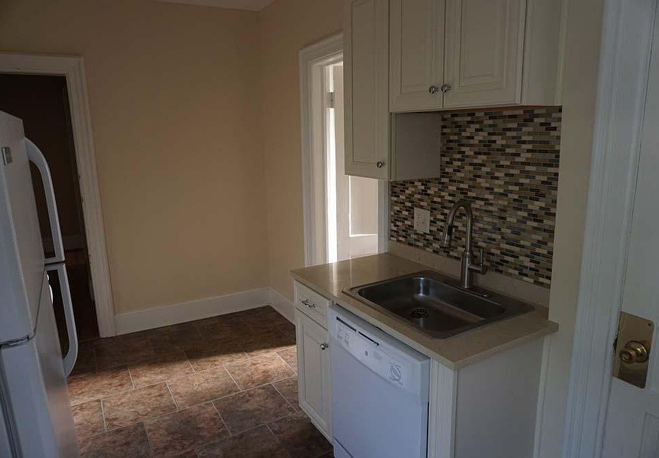 New kitchen with dishwasher under sink