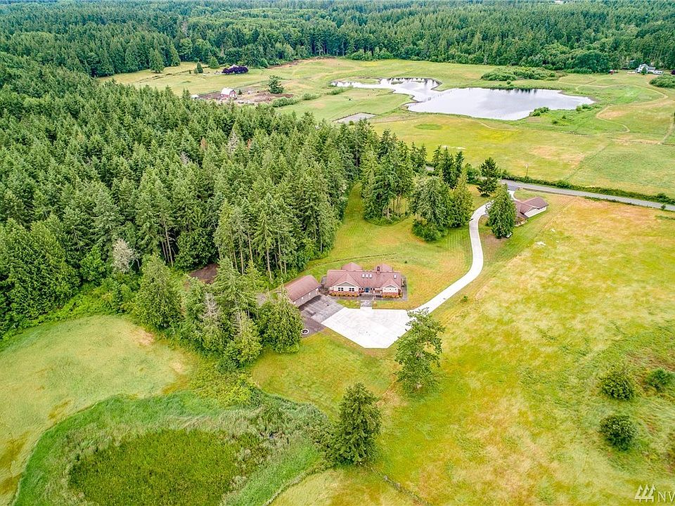 The 4.83 acre property is a picturesque mix of open space and woods, located only 10 minutes from downtown Port Townsend.