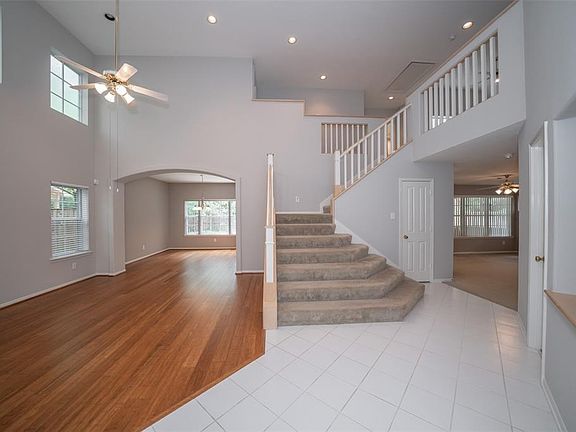 Dramatic two story entrance with tile entry.