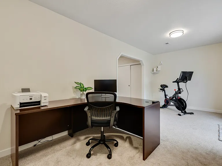 Lower Level
+Office / gym
+Desk
+Printer
+Monitor
+50"
+Peloton bike (big seat)
