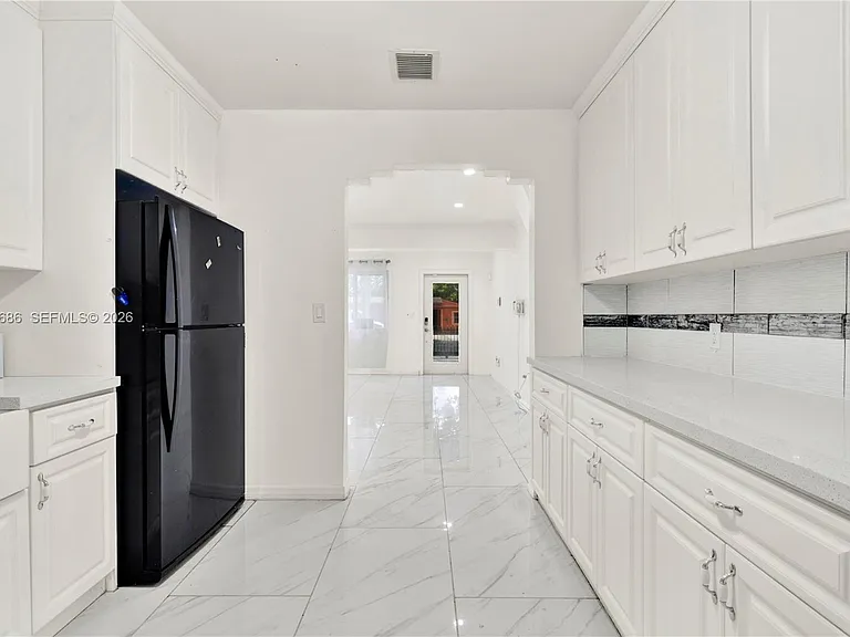 135 NW 121st St — Photo 12