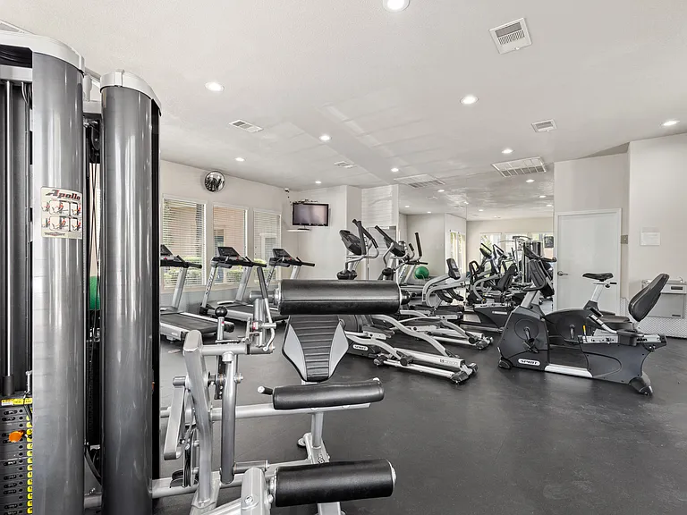 Large community gym, water fountain, and convenient bathrooms