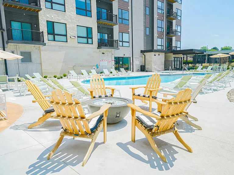 Unwind by the fire pit and relax with friends in our beautifully designed poolside seating area.