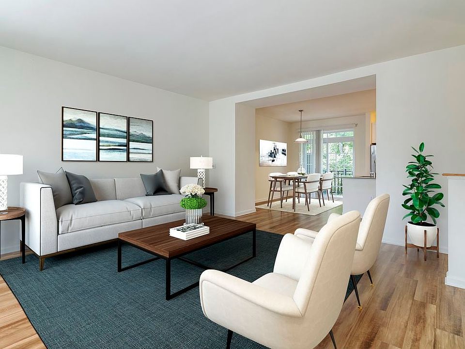 Renovated Package II living and dining area with hard surface flooring