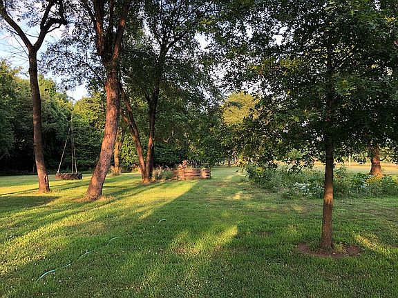 Compost pit and garden plot