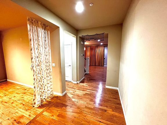 Entrance view of hallway and bonus room on the left