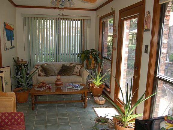 Very cozy and bright sun room. Perfect for reading & enjoying a cup of coffee