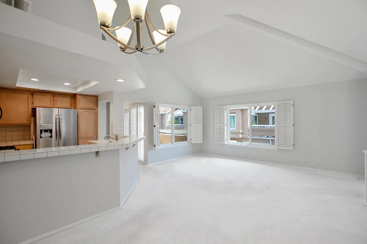 Living room, now with new oak hardwood floors - 24241 Swiftriver Ct