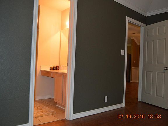 Master bath has garden tub and separate shower.