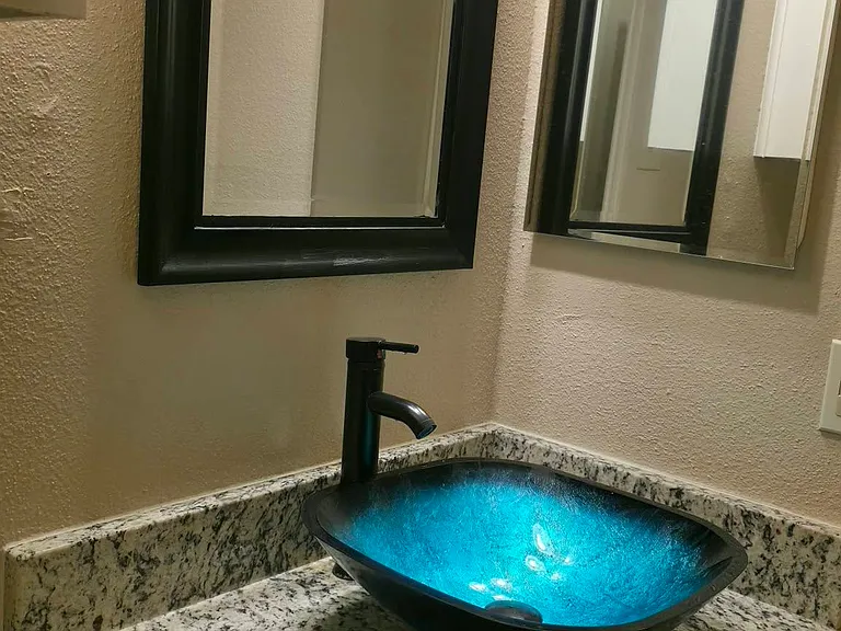 New granite vanity and vessel sink