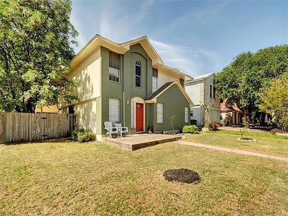 The home is located on a corner lot and has great curb appeal.  It is located in the very desirable Milwood neighborhood, which is very established and has many tall, beautiful trees.