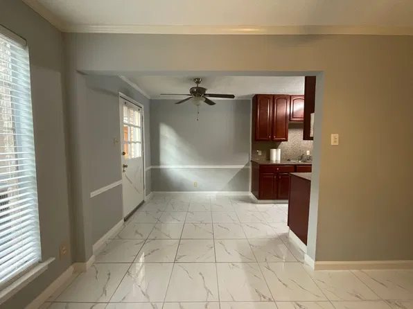 Fully renovated and remodeled Large 3 Bedroom and 2 Bath Apartment with a 2-car garage and a priv...