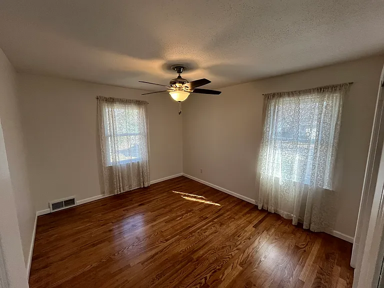 Two beautiful bright and sunny windows + NEW fan/light that matches 3 other rooms. Hardwood Oak is beautiful.
