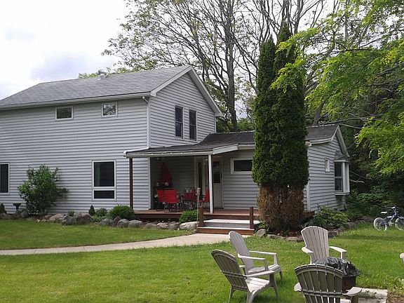Back of house showing deck