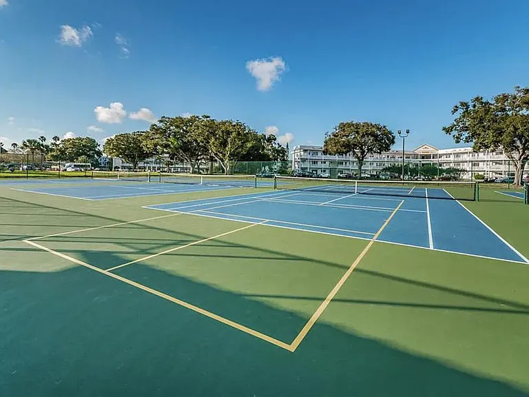 tennis courts by main pool