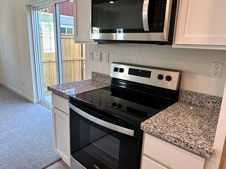 Electric gas stove & microwave with ample storage