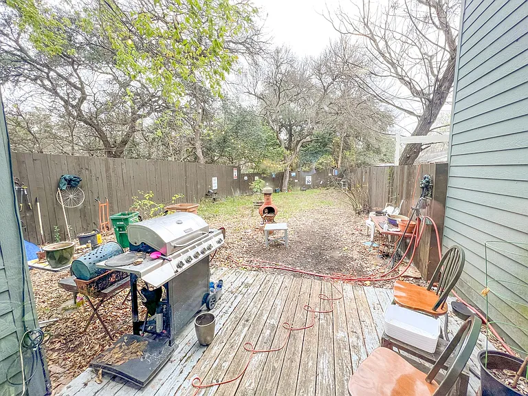 HUGE deep yard, lots of potential