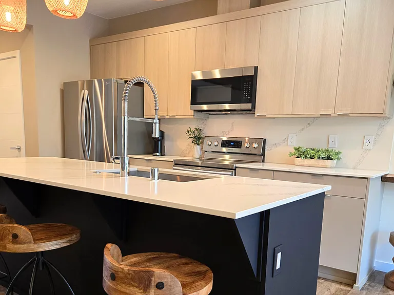 Your kitchen provides upscale appliances and a deep, stainless sink