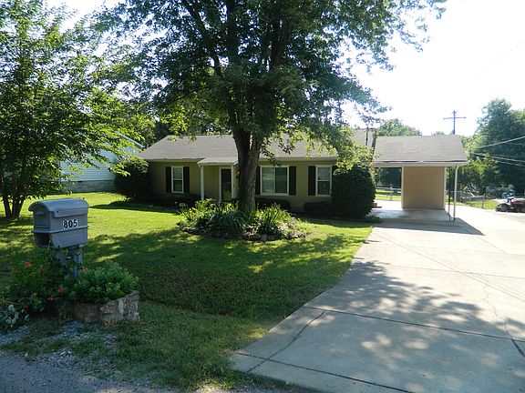 greenery abounds everywhere around this home